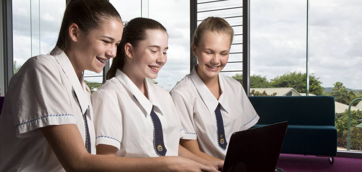 HAPPY STUDENTS: Students (from left) Izabella Lloyd, Chelsea Lambert and Lucy Martin love learning at Sheldon College. 