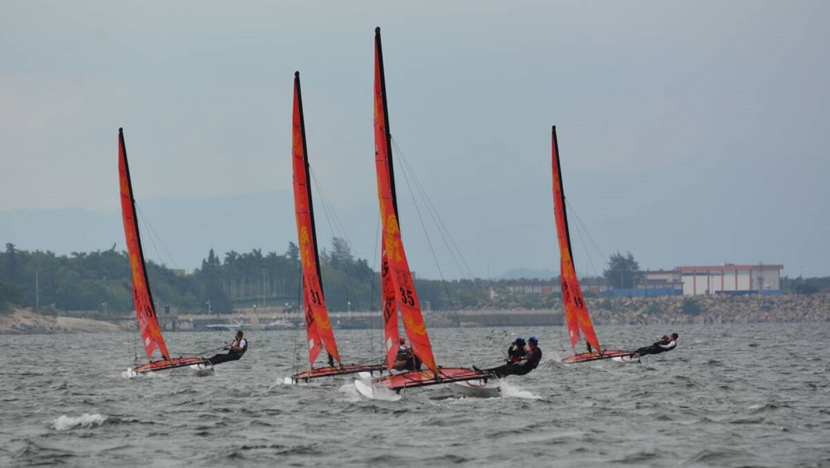 Father and daughter team Rob and Haylie Andrews from Cleveland lead the fleet in the World Championship Hobie 16 event in China this month. 