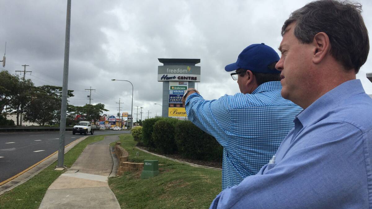 Tim Nicholls, the former Treasurer, inspects Redland Bay Road at Capalaba with the candidate Steve Davies during the 2015 election campaign. PHOTO: Judith Kerr