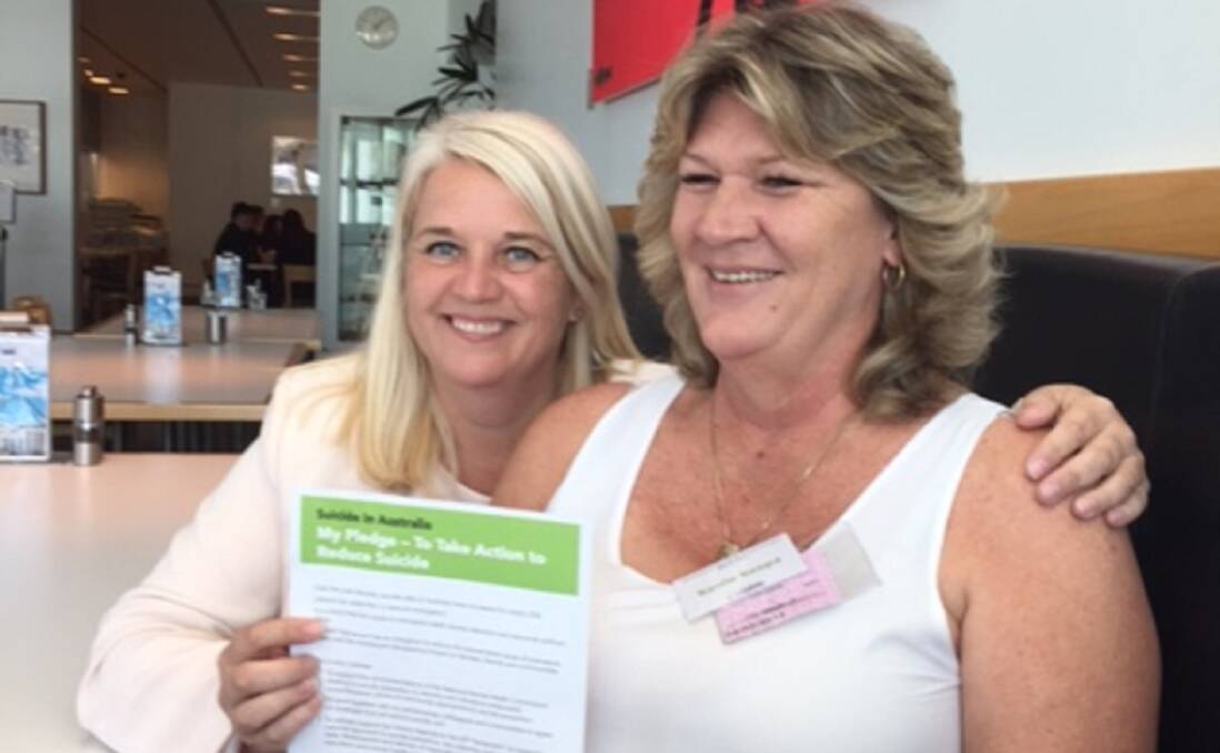 Capalaba mum Kerrie Keepa, right, with ALP candidate for Bowman Kim Richards who signed a pledge to help curb the rising suicide rate in Redlands. 