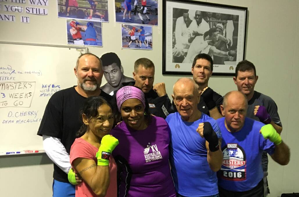 Redlands Master Boxing team with trainer Graeme Prowse, front right, will compete at the state titles next week.
