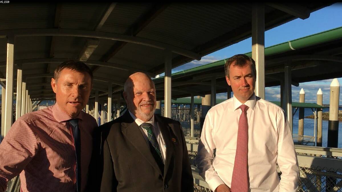 Bowman MP Andrew Laming, left, with Bay Islands Chamber of Commerce president Col McInnes and federal Justice Minister Michael Keenan at the Weinam Creek ferry terminal where CCTV cameras will be installed. PHOTO: Judith Kerr