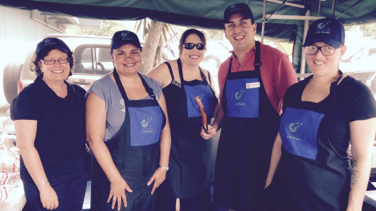 MP Don Brown at Capalaba Bunnings helps out volunteers Annie Garner, Melanie Meredith, Leiza Johnson and Niki Rose.