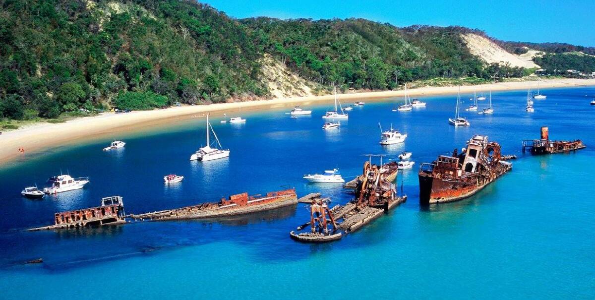 BEFORE: a photograph of the pristine Tangalooma Waters of Moreton Island before the state government lopped off the tops of 15 hulks that acted as an artificial reef. 
