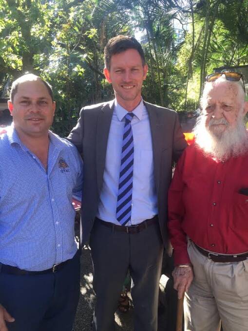 QYAC chief executive Cameron Costello with Environment Minister Mark Bailey and island elder Uncle Bob Anderson at the rally