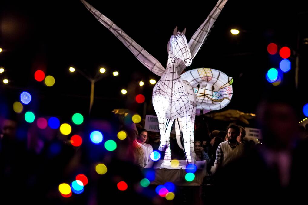 LIGHTING UP: The RedFest lantern parade. The 59th edition of the popular festival will feature a strawberry eating competition, drag racing for dogs, a kids' fun club and sideshow alley.