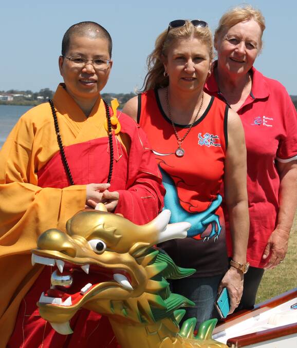 The Venerable Chueh Shan with Redlands Sea Dragons member Donna Murphy and president Rosemary Andrews. Ven. Shan was one of three monks who blessed the club's new boat and 'opened' its dragon's eyes.  