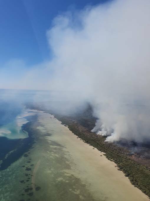 FIRE: A bushfire burning on North Stradbroke Island south of Dunwich and west of East Coast Road earlier this year. Photo: QYAC