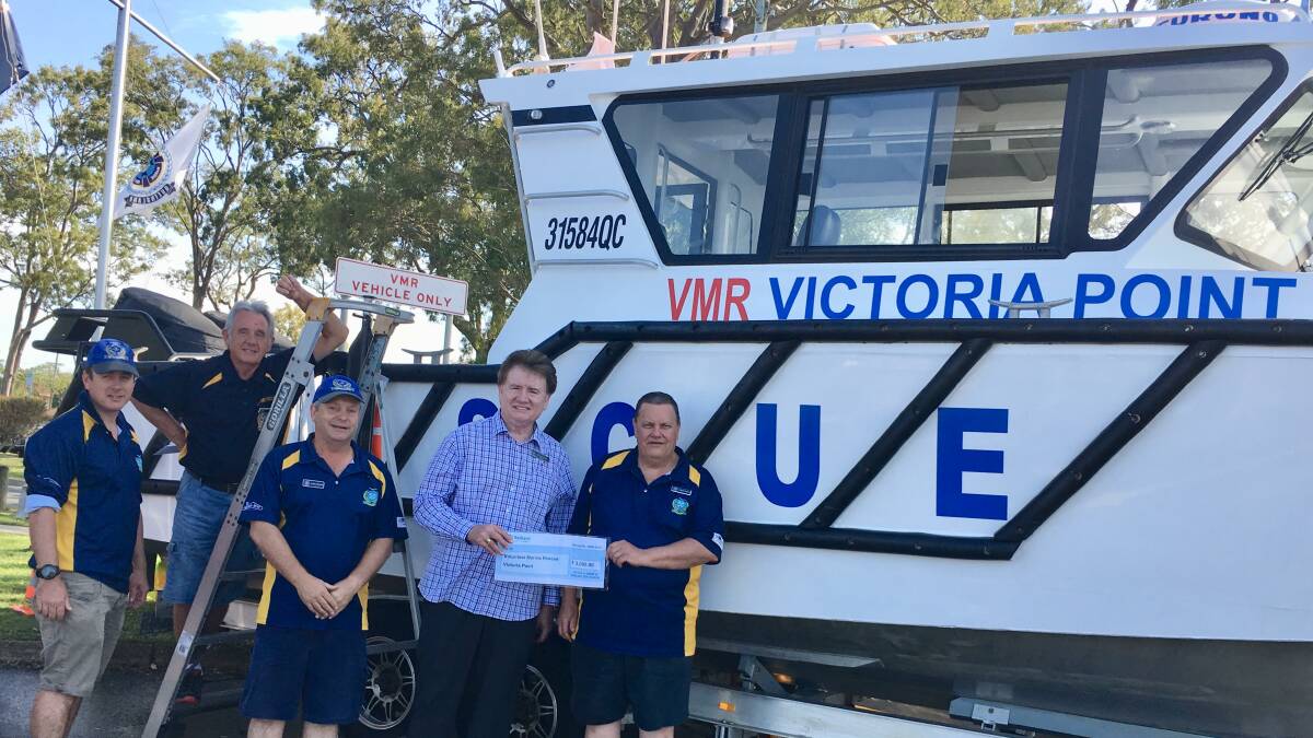 SEE THE LIGHT: VMR members Nathan Shearer, Del Mirams, Glenn Ferguson, Cr Lance Hewlett and Greg Wiffen with a handy cheque.