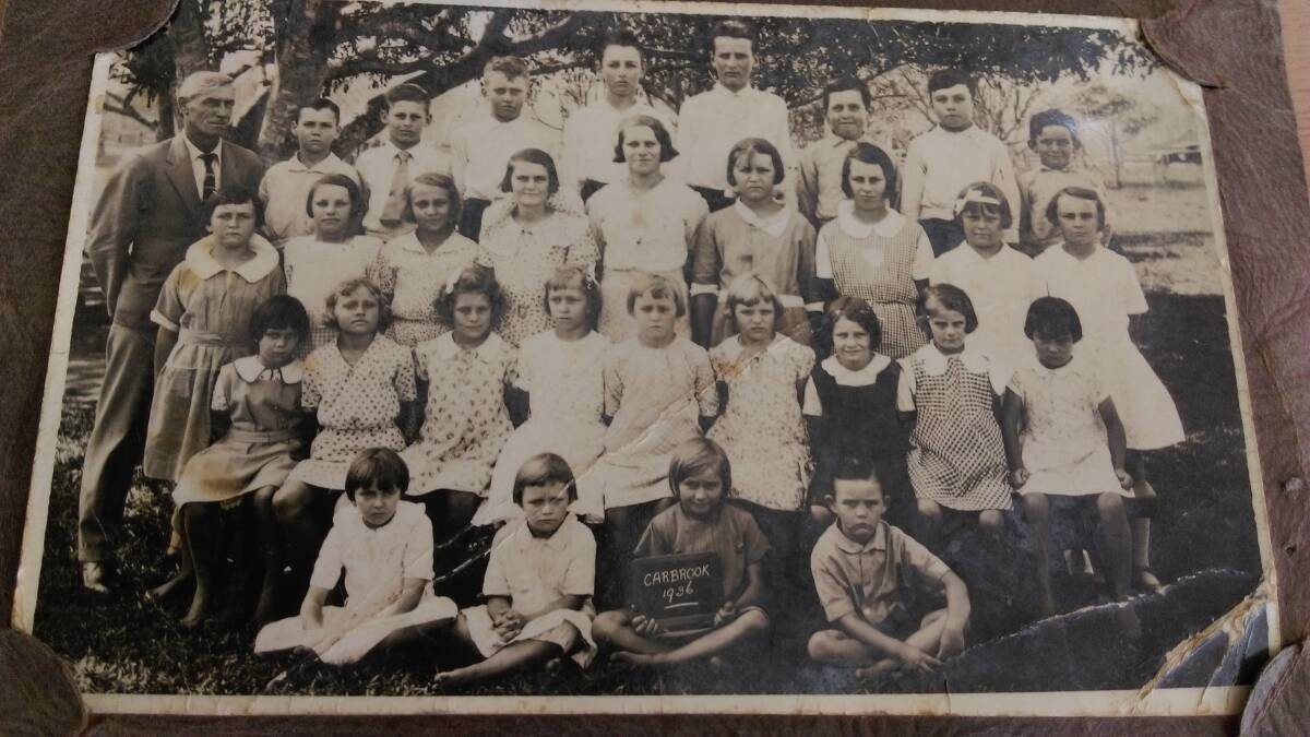 SCHOOL'S IN: The entire Carbrook State School in 1936. Betty is in the front row of those seated on the bench, second from left. 