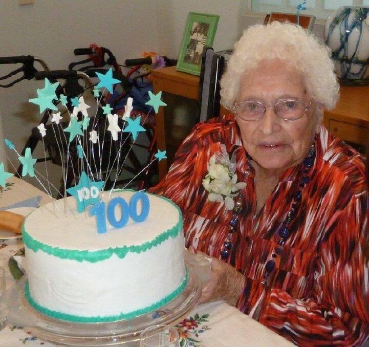 A SWEET 100: Rita Lugton with her birthday cake as she celebrates her 100th birthday. She played bowls into her 90s.
