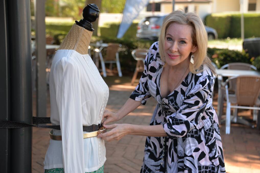 confusing times: Jackie Fennell of Bellabeachie boutique at Wellington Point. Women are still buying summer lines, despite winter stock being in store.