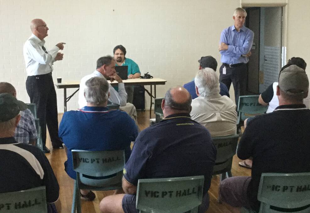 TALKS UNDER WAY: Fishermen, Biosecurity Queensland and federal government staff at a meeting at Victoria Point to discuss white spot disease in prawns.