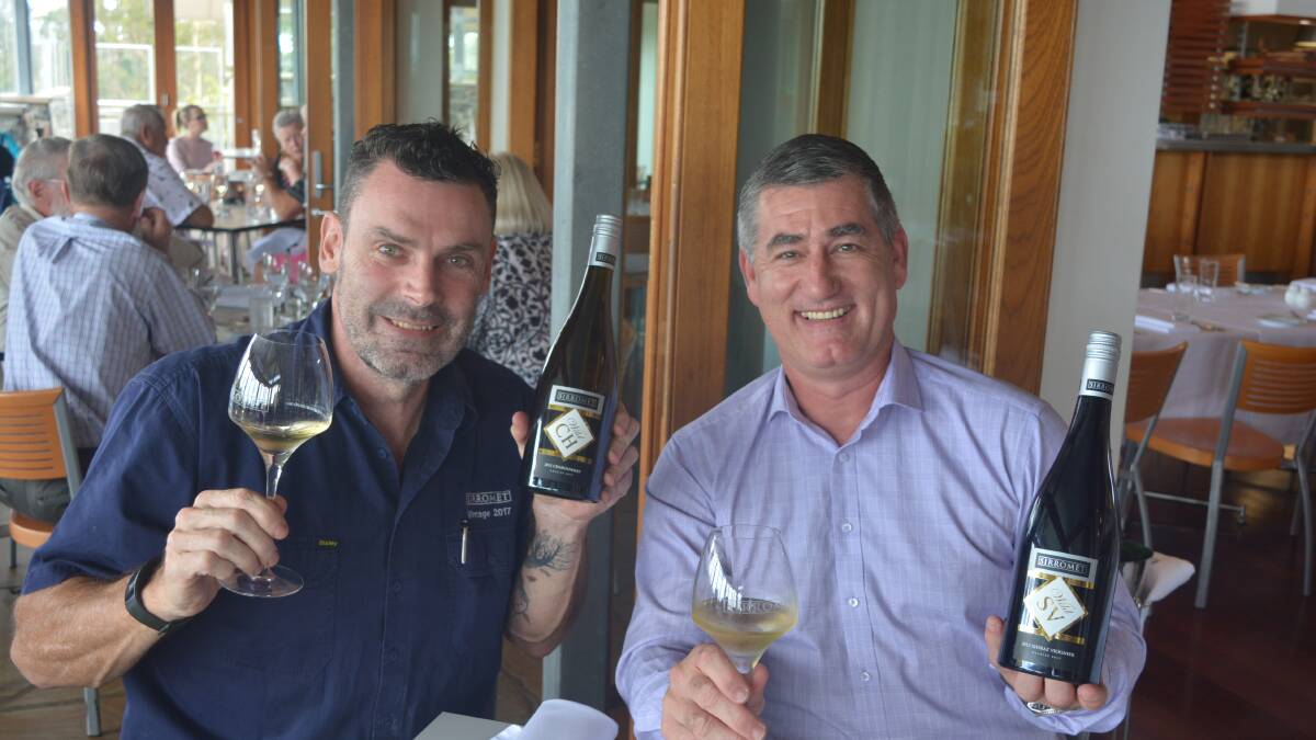 TASTY DROP: Sirromet winemaker Adam Chapman and Redlands local Norman Schroeder.
