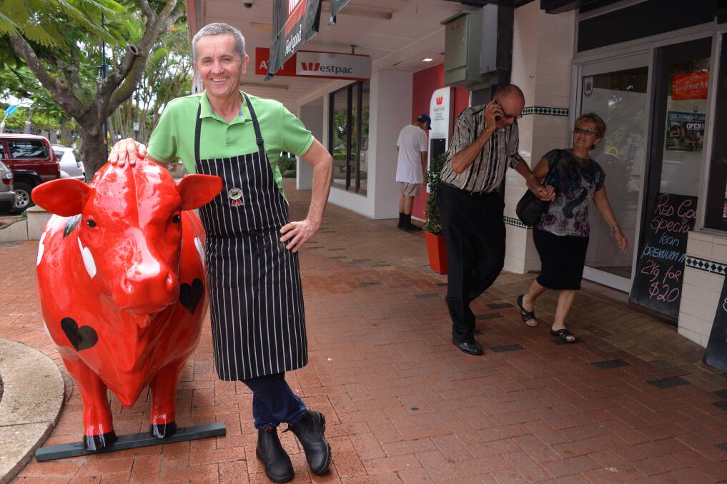 NO BULL: Cleveland butcher Will O'Brien says his Ferrari-red bovine addition to the streetscape always sparks comment from passersby.