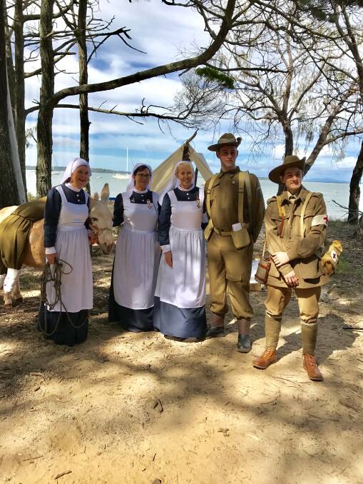 COOCHIE CALLING: An ANZAC Day reenactment last year on Coochiemudlo Island featuring WWI stretcher bearer John Simpson and his donkey and nurses.