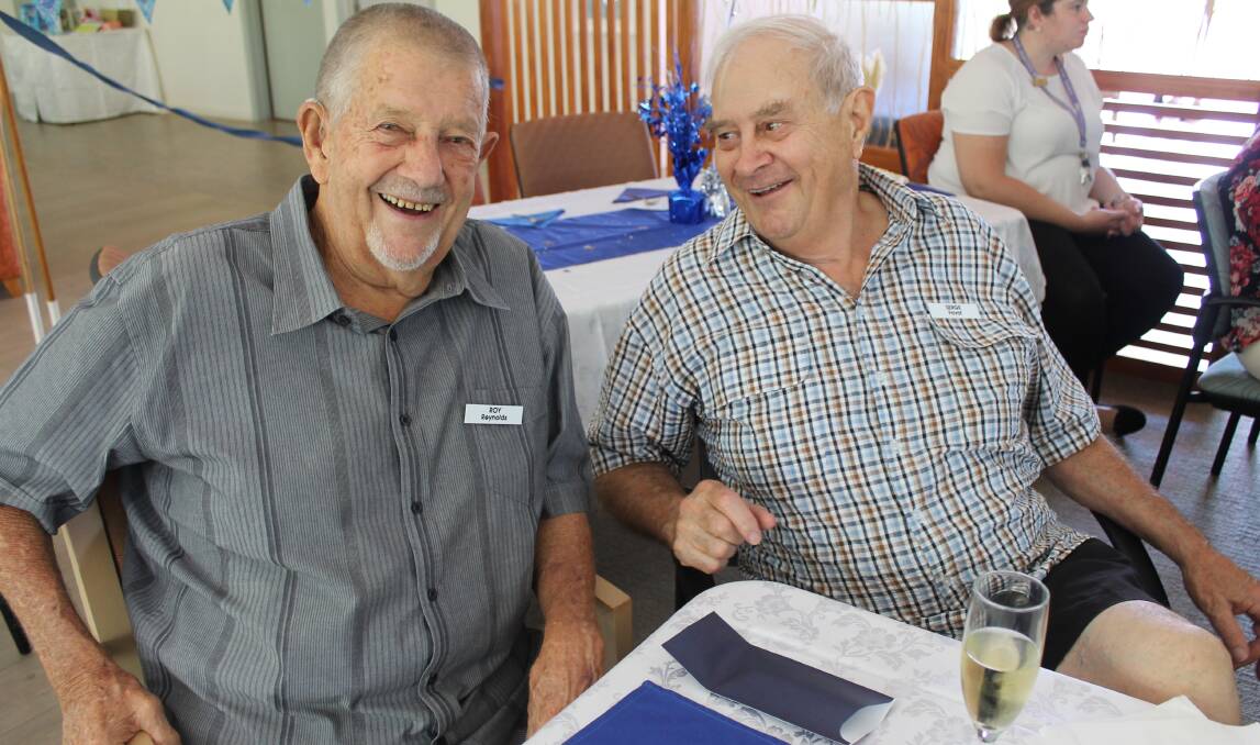 BEST MATES: Roy Reynolds and Serge Favet of the RSL Care Moreton Shores home help Lindsay Boyd celebrate his birthday.
