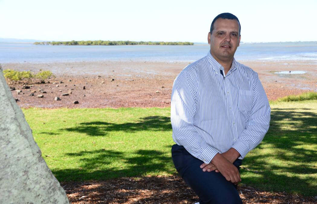 PROPOSAL REDRAWN: Walker Corp's Peter Saba at the Toondah foreshore with Cassim Island in the background. A referral to the federal environment department has been revamped to lessen impacts on the island.