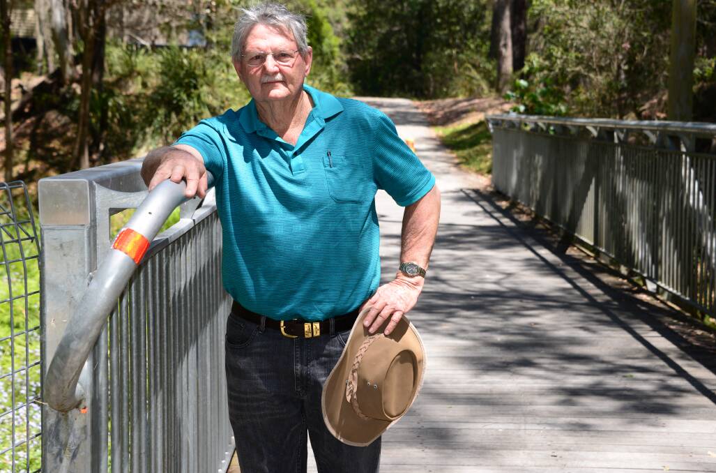 BUSHLAND OPENED UP: Victoria Point resident Ian James says an existing pathway through Eprapah Creek bushland has become a social and environmental nightmare and a second track will make issues worse.