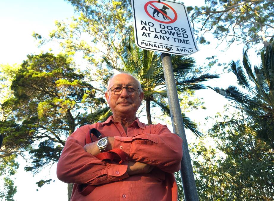PROTESTER: David Paxton ... protesting about a Redland City Council crack down on roaming cats and dogs.