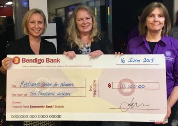GIVING: Redlands Centre for Women president Lisa Nardone, Redlands Community Breakfast founder Sheena Hewlett and RCW acting chief executive Kerri Long with that big cheque.