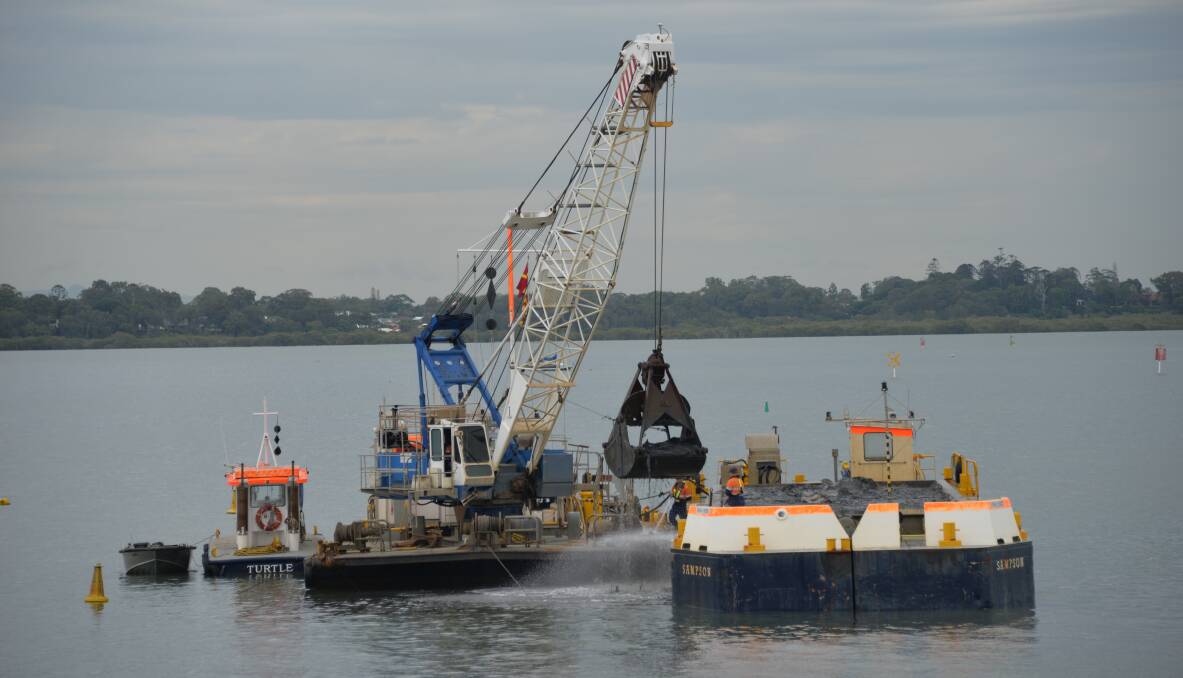 CHANNEL WORK: Dredging under way at Raby Bay.