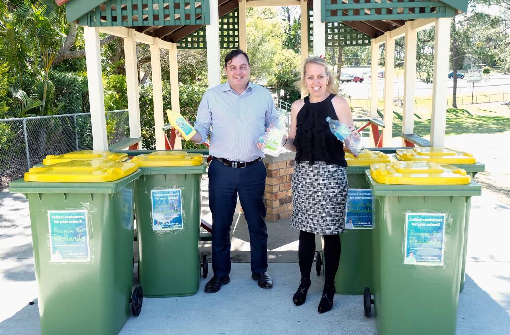 RECYCLERS: Mount Cotton State School principal Meagan Steward shows MP Matt McEachan six bins that students have filled with containers.