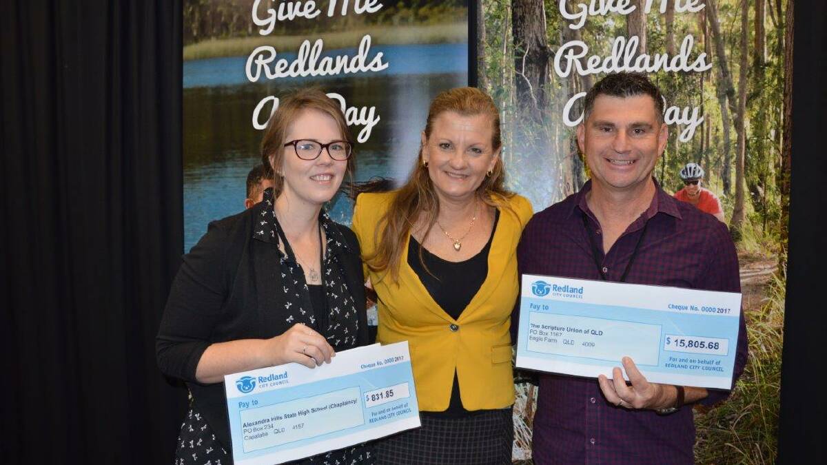 CHEQUE TIME: Alexandra Hills State High chaplain Bethany Smith, Mayor Karen Williams and Scripture Union Queensland regional manager Jeff Howard.