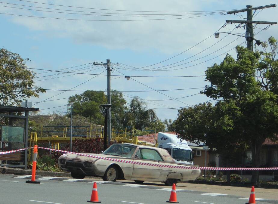 WHEELS: Vintage cars were brought onto the Capalaba set about 1pm. Photo: Jordan Crick