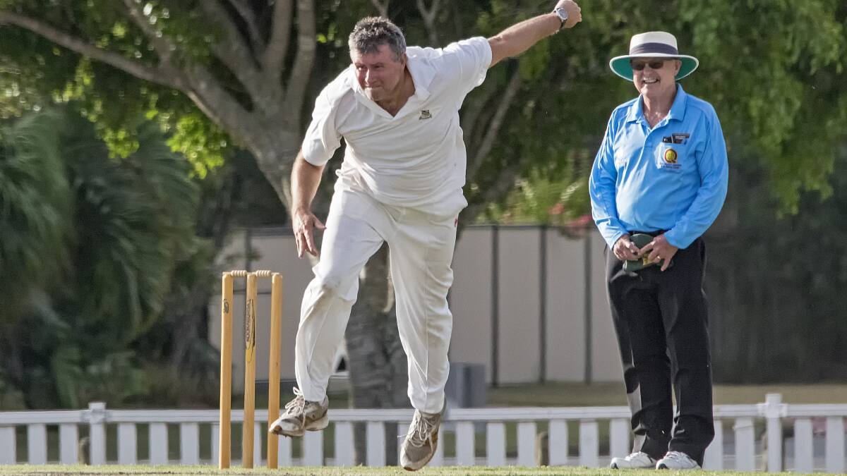 MASTERS: Redlands Over 40s player Evan Bancroft in action in last Sunday's game against University under the watchful eye of local Wellington Point umpire Ross Howard. Picture: Doug O'Neill
