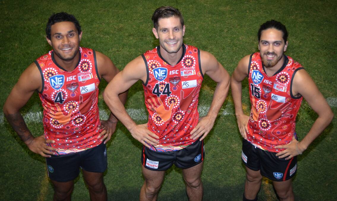 NEW DESIGN: Redlands players Peter Yagmoor, captain Tom Salter and Aaron Christensen show off the Bombers' first ever Indigenous-themed guernsey. Picture: Highflyer Images.