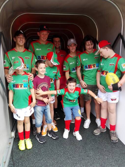Redlands Modified Rugby Program players and mentors in the Reds tunnel at Suncorp Stadium.  Picture: Marina Feeney