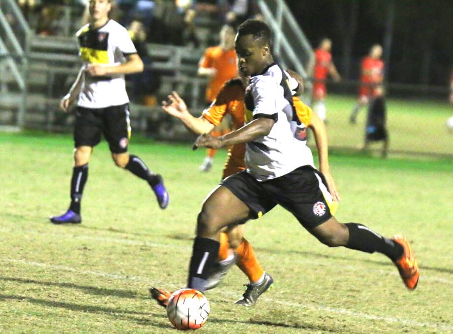 GOING FOR GOAL: Redlands United's Delors Tuyishime doubles the lead with a great goal for the Red Devils during their 3-0 PS4 National Premier League win over the Brisbane Roar NPL side. Picture: Ray Gardner