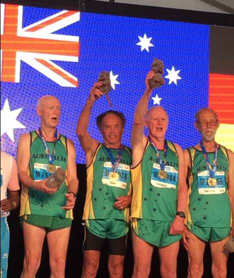 Pio Bunin, second from left with members of the Australian Masters team.