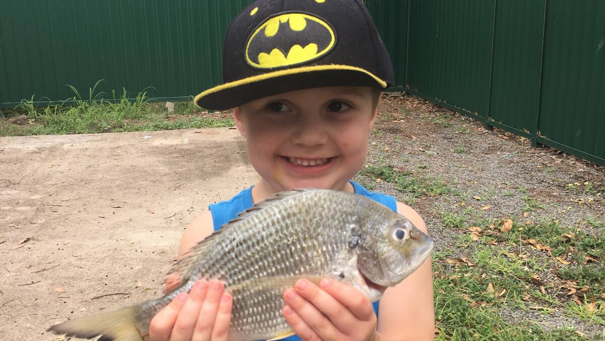 Thrilled: Hayden McKirdy was happy with a bream he caught on the beach in NSW. Photo: Supplied