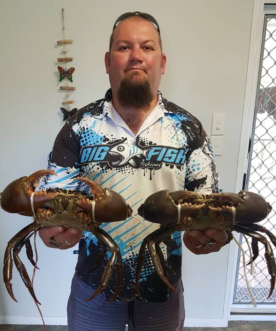 Great catch: Clint Baldwin scored a good catch of mud crabs after this week's rain at Jumpinpin. Photos: Supplied