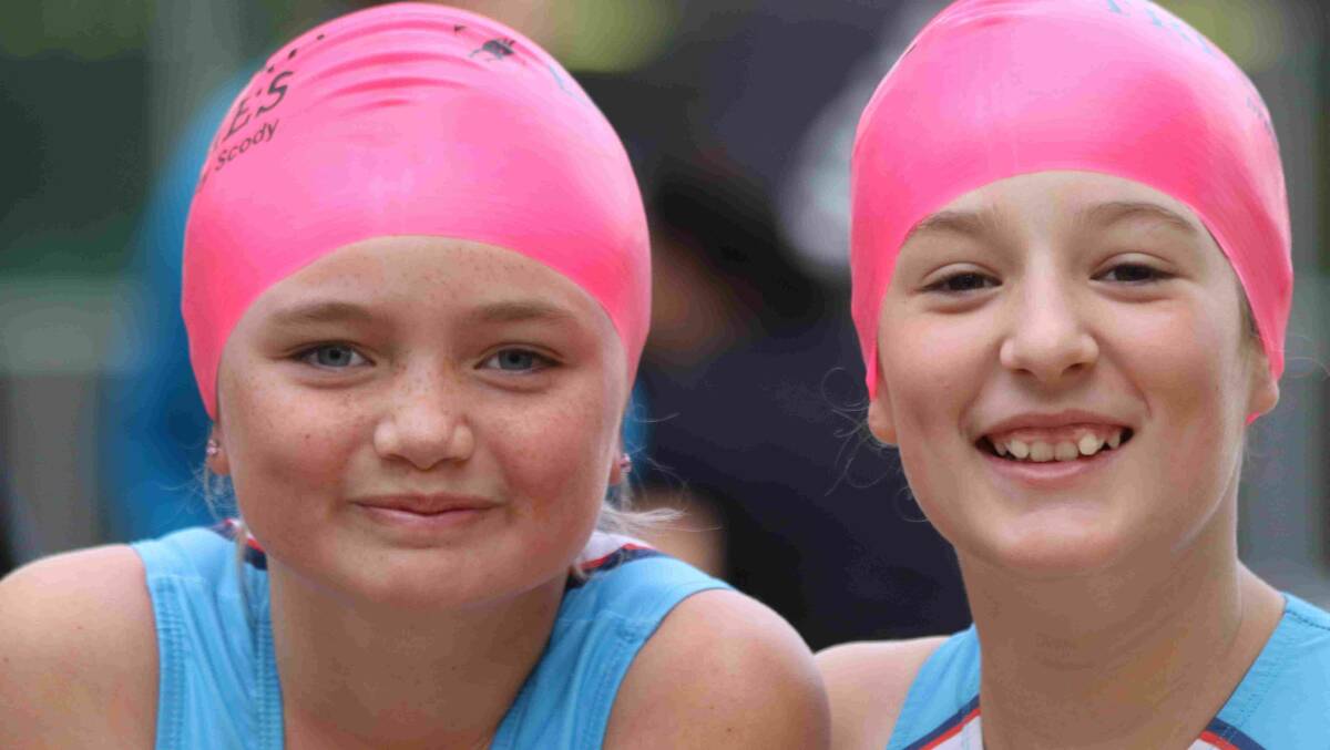 Azzezah Anderson and Lily Moore were all smiles at the Raby Bay Triathlon.