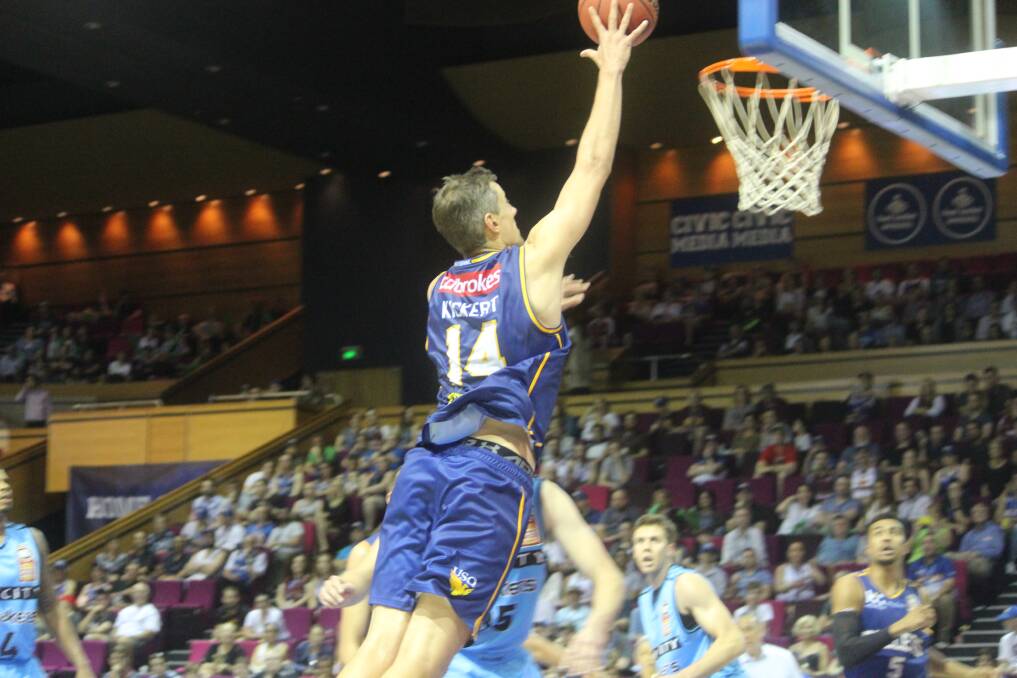 To the hoop: Bullets big man Daniel Kickert skies to the basket for two of his 15 points on the night: Photo: Joshua Paterson
