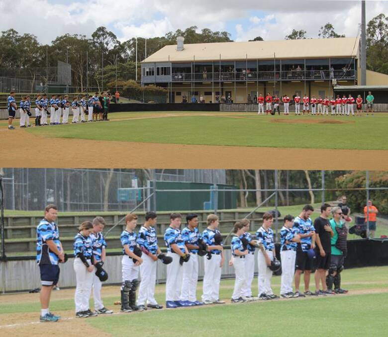 Pause to remember: Redlands Rays Junior League Bandits and Carina Redsox Junior League Bandits stop the game for a minute’s silence on Remembrance Day on Saturday at the Redlands Baseball Club. Photo: Supplied