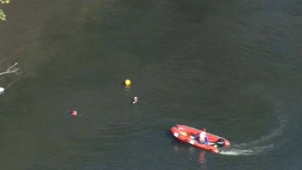 Police are searching for a vehicle with a child inside in the Hawkesbury River. Photo: Nine News