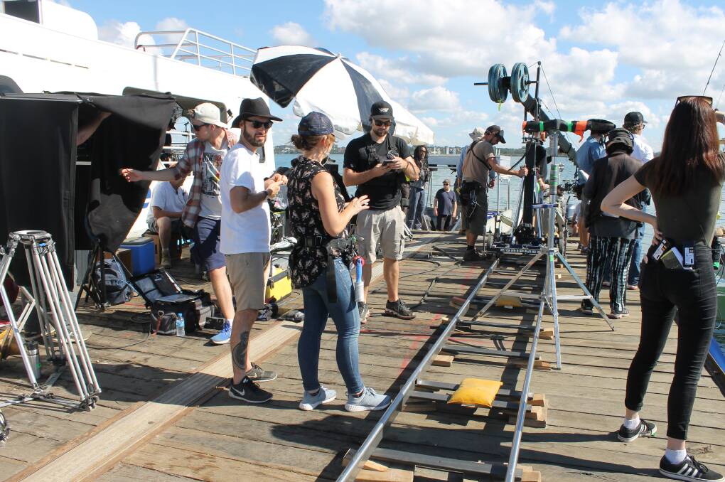 ON SET: During filming of In Like Flynn on Moreton Bay off Raby Bay. Photo: Cheryl Goodenough