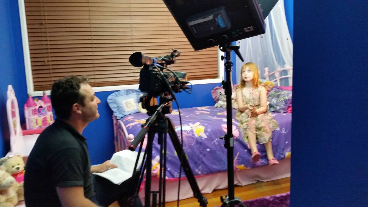 BEING FILMED: Six-year-old Ella Wynn is interviewed for the BBC television series.
