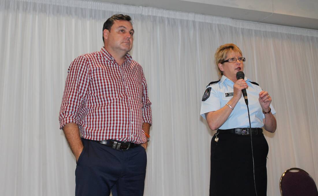 SPEAKING TO RESIDENTS: Cleveland police station officer-in-charge Senior Sergeant Janelle Harm talks at the forum, while MP Matt McEachan looks on. Photo: Cheryl Goodenough