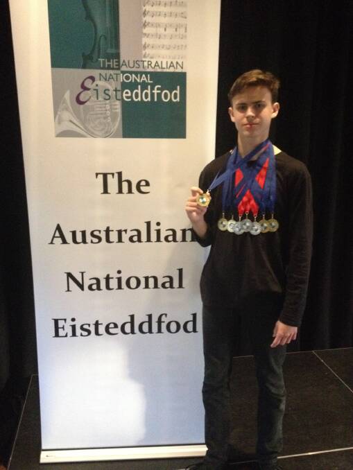 WINNER: Ormiston College student Vincent D’Amico with the gold medals he won at an eisteddfod in Canberra recently.