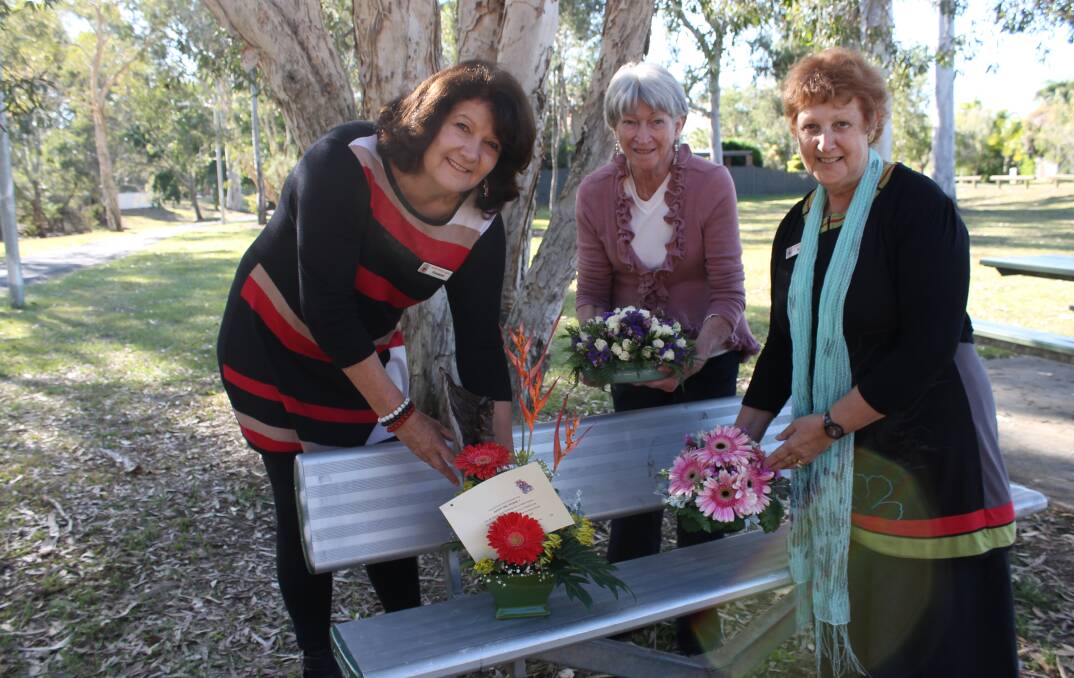 SPREADING KINDNESS: Redlands Floral Art Club committee members Val Decker, Irene Corbett and Lynda Reynolds will be amongst those dropping off bouquets for lucky recipients to 'adopt'. Photo: Cheryl Goodenough