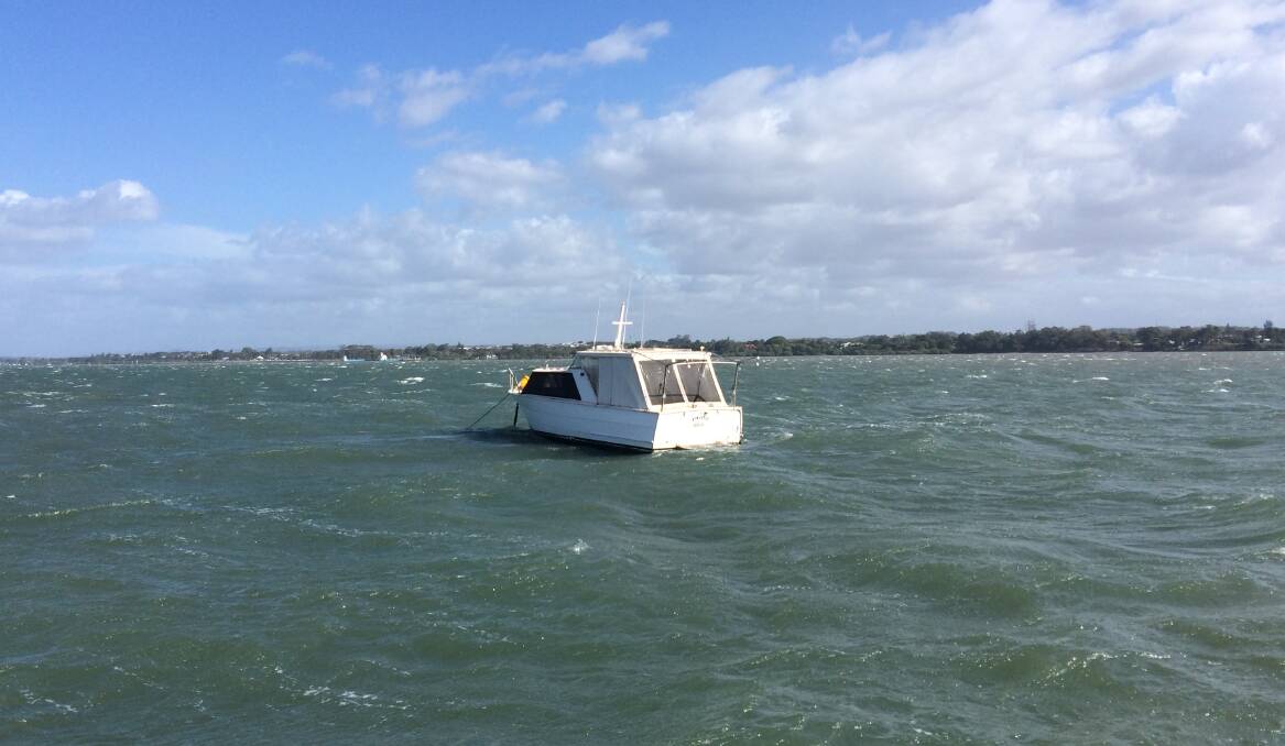 Reanchored: A boat that went adrift on Sunday was reanchored by Redland Bay Coast Guard after Water Police obtained permission from the owner. Photo: Redland Bay Coast Guard