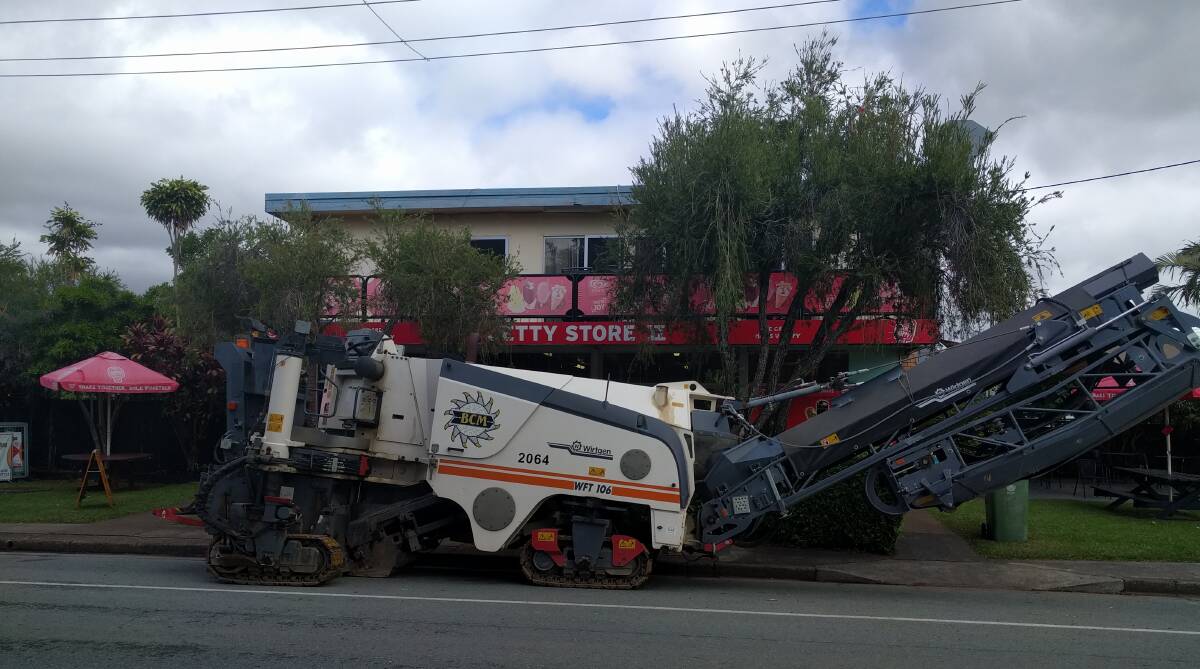 TAKING UP SPACE: This road-making machine took up two-hour zoned parking bays in front of a Redland Bay business, near Weinam Creek ferry terminal, for about 48 hours.