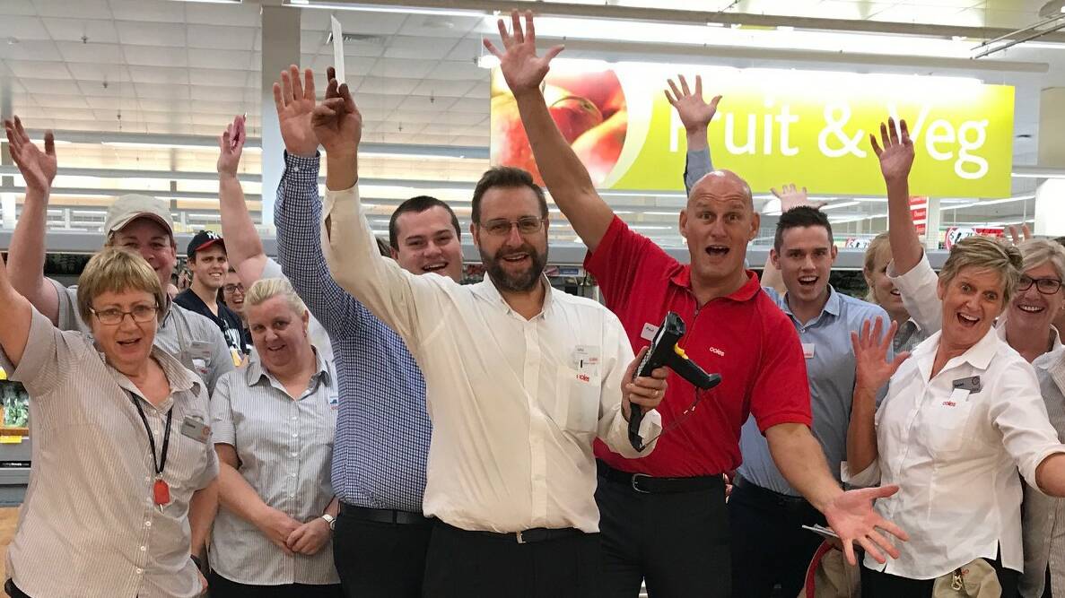 CELEBRATING: John Giacomantonio, with team members from Coles Capalaba, celebrates 30 years with the company. Photo: Supplied