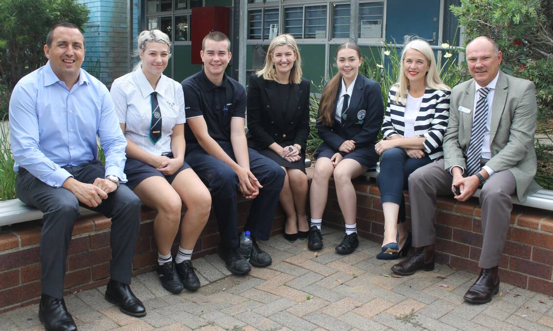 IN REDLANDS: MP Don Brown, students Madison Hill and Zane Bagnall, Skills Development Minister Shannon Fentiman, student Tyla Coey, MP Kim Richards and Victoria Point State High School principal Scot Steinhardt. Photo: Cheryl Goodenough