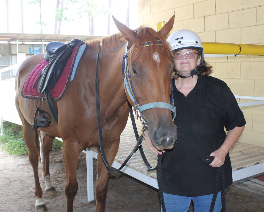 READY TO RIDE: Horse riding coach Loretta Lunt with one of CPEC's horses Trevor. Photo: Cheryl Goodenough